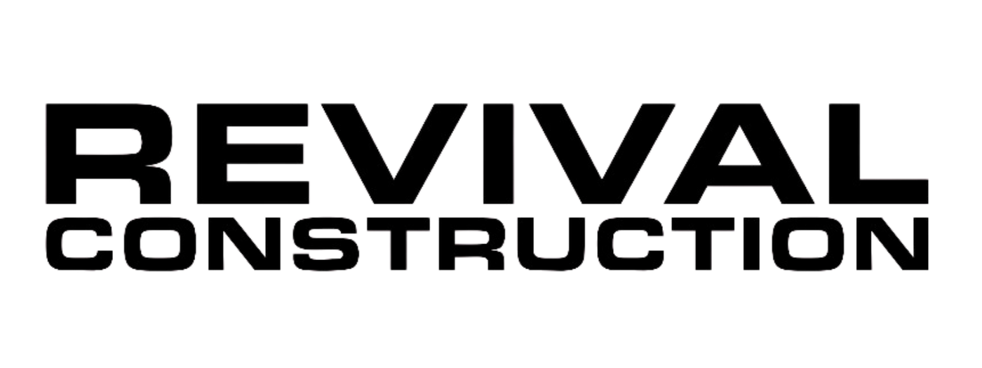 Black text logo displaying "REVIVAL CONSTRUCTION" in bold, cutout-style uppercase letters, with "REVIVAL" above and "CONSTRUCTION" below, set against a transparent background.