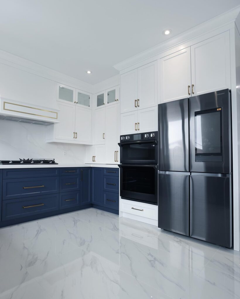 a kitchen with a refrigerator and oven