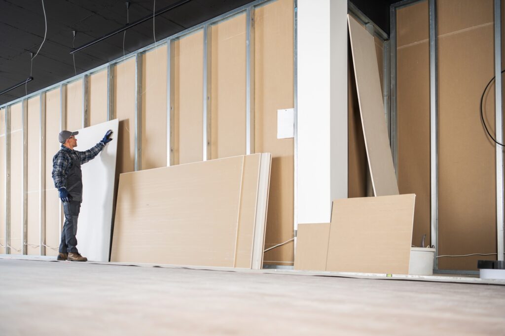 Contractor Selecting Drywall Panels