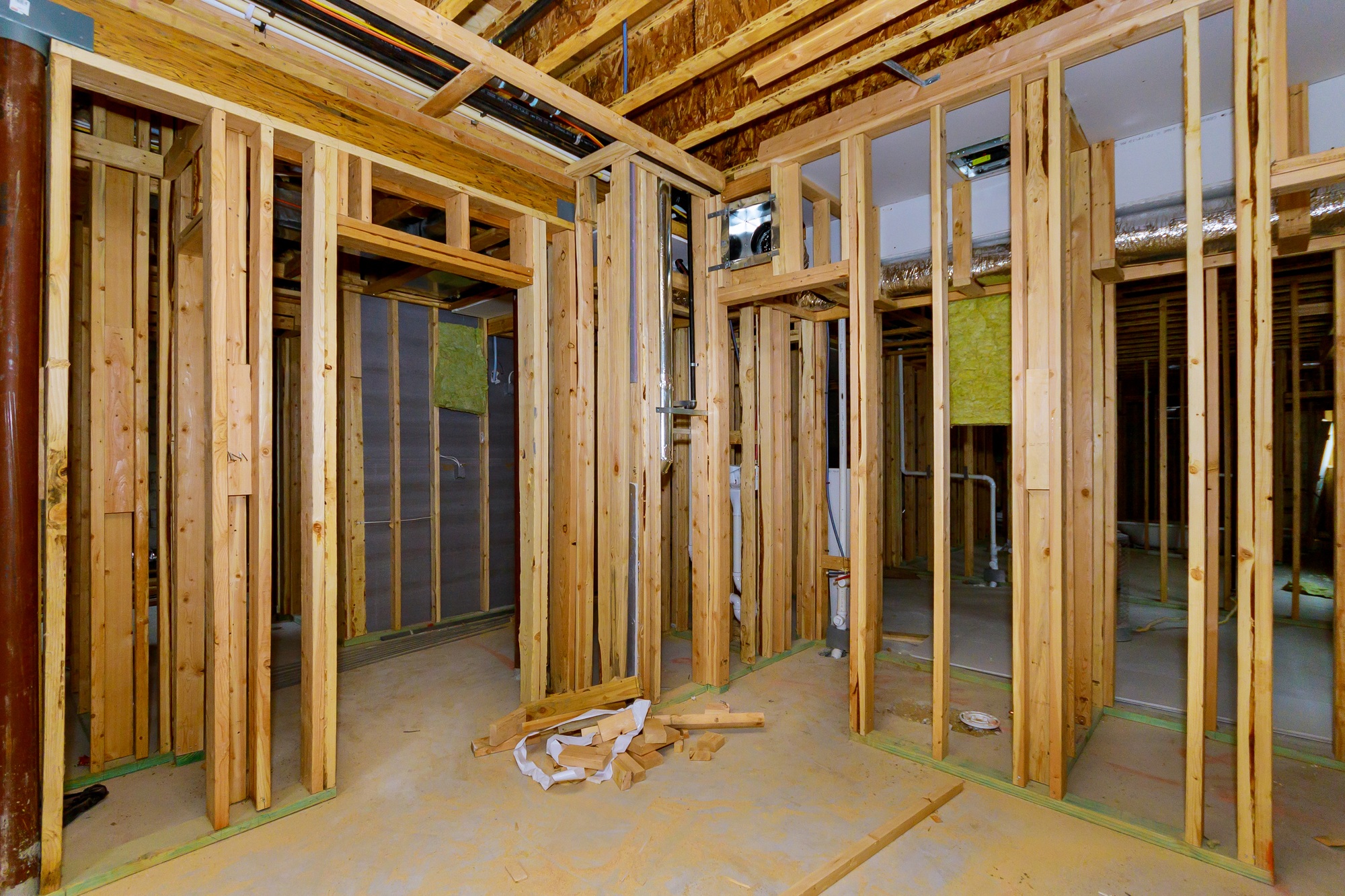 Residential home beams wall framing stick basement unfinished under construction